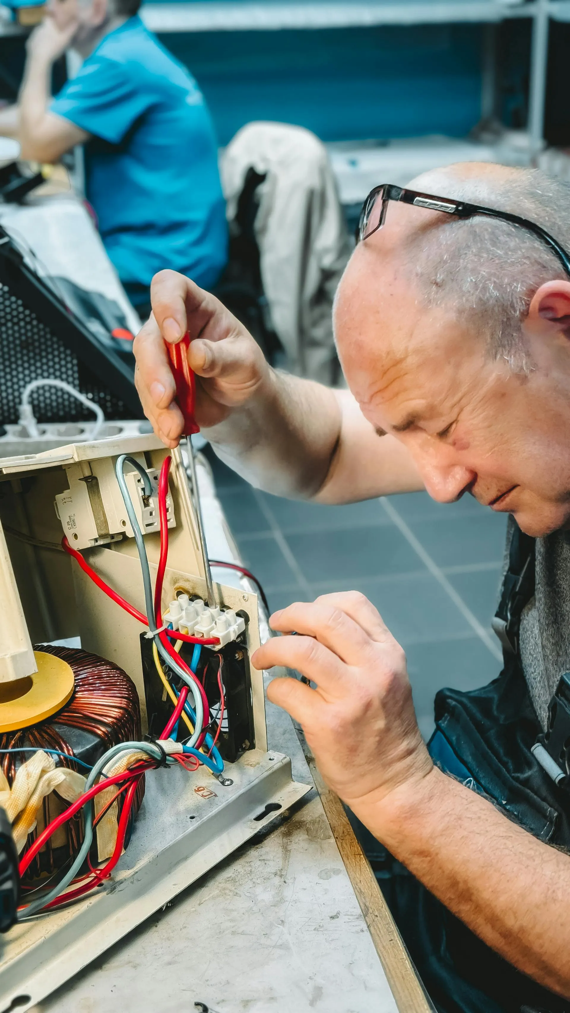 Professional electrical engineer performing system installation